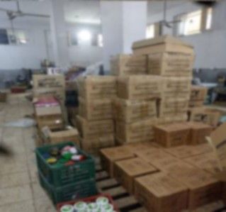 ضبط مصنع مستحضرات تجميل غير مرخص بالجيزة.. 6 أطنان مواد خام و11 ألف عبوة مجهولة المصدر