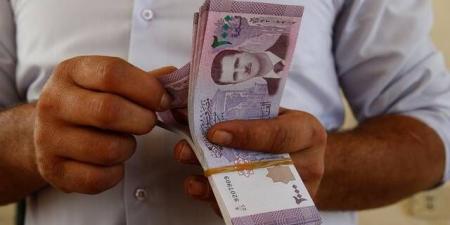 بتعاون
      روسي..
      سوريا
      تحذف
      صفرين
      من
      الليرة
      وتصدر
      أوراقاً
      نقدية
      جديدة
      ديسمبر
      المقبل